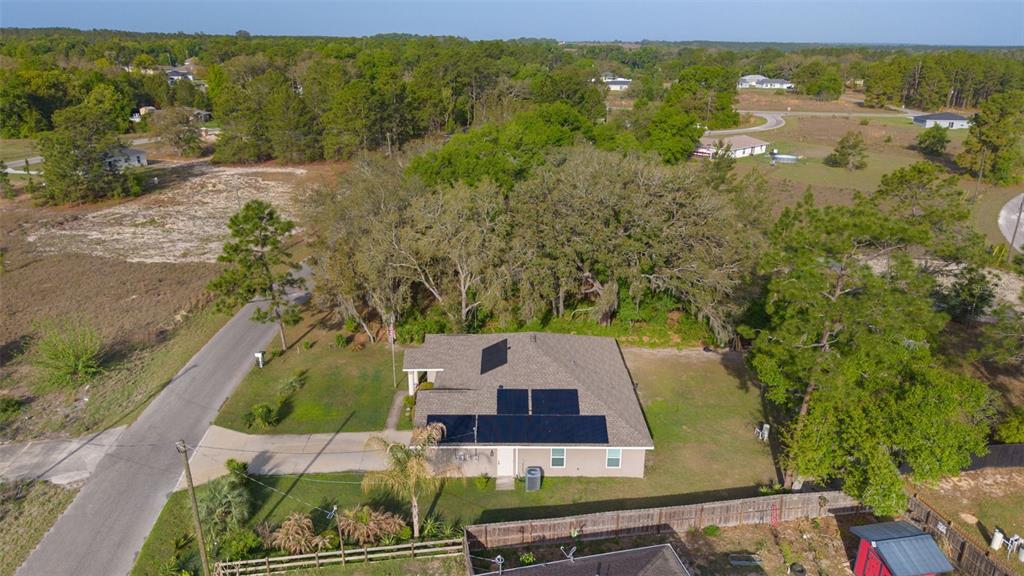 13 Malauka Radial Run Road Ocklawaha, FL 32179 - Photo 8 of 32 an aerial view of residential houses with outdoor space