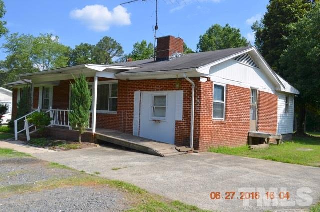 4621 Redwood Road Durham, NC 27704 - Photo 3 of 13 a view of a house with a yard