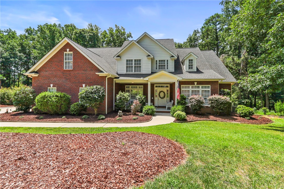 103 C-10-147D Anderson, SC 29621 - Photo 1 of 49 A classic brick and siding residence with mature landscaping welcomes you home.