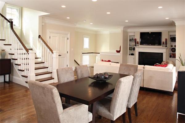 59 Green Street, Unit 2 Brookline, MA 02446 - Photo 3 of 8 a living room with furniture and a flat screen tv