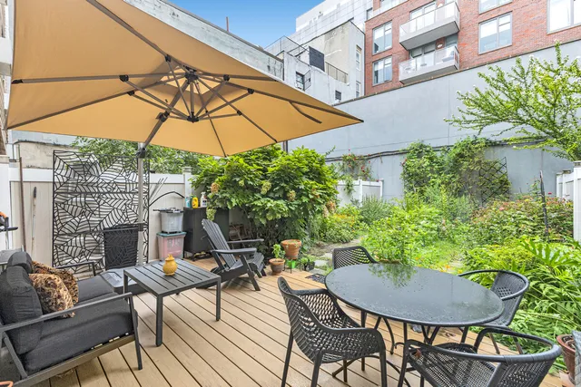 a view of a bedroom with a small yard
