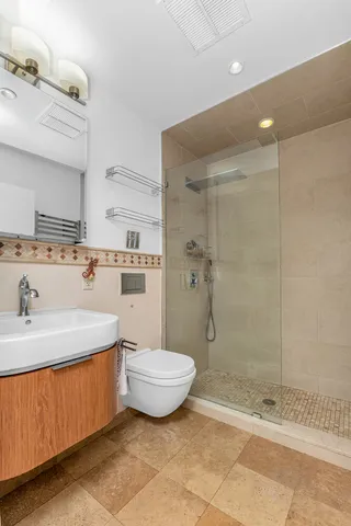 a bed room with a bed and a window