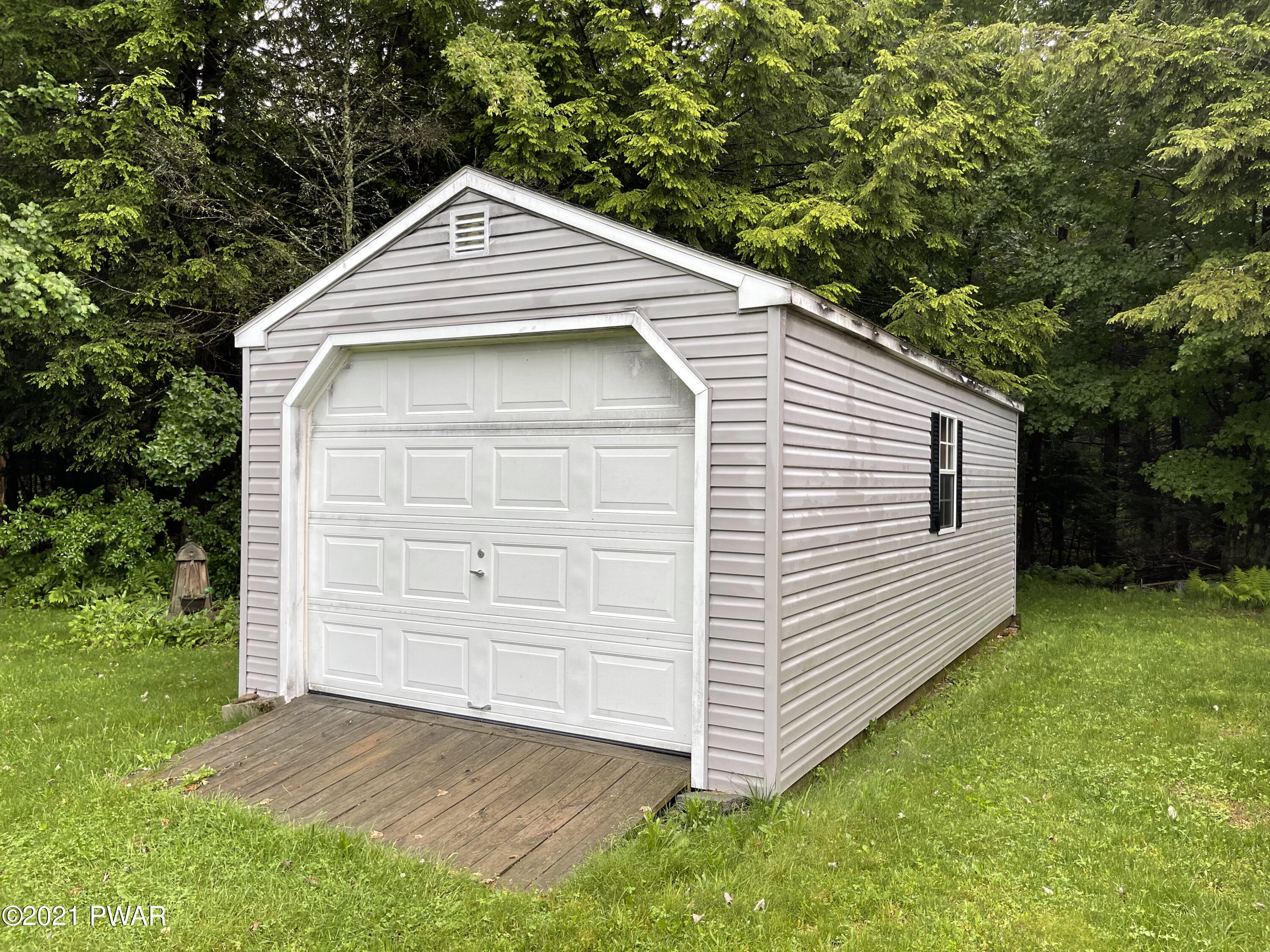 368 Roemerville Road Greentown, PA 18426 - Photo 45 of 59 a front view of a house with a yard