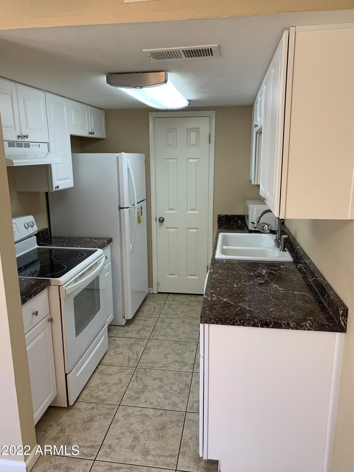 600 South Dobson Road, Unit 198 Mesa, AZ 85202 - Photo 1 of 6 600 DOBSON 198 KITCHEN