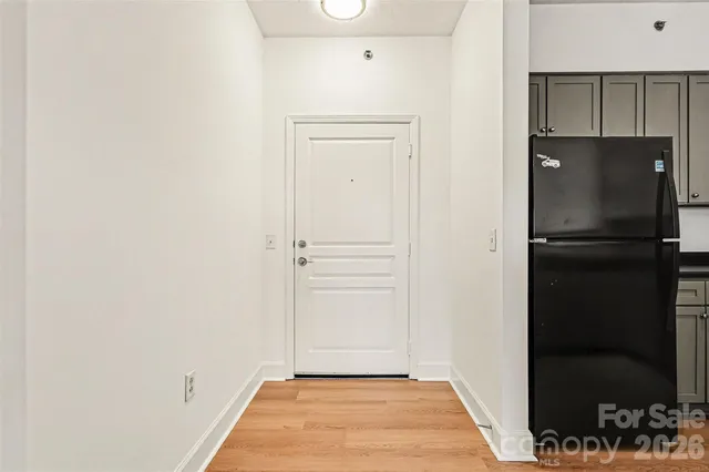 a kitchen with stainless steel appliances a stove sink and cabinets