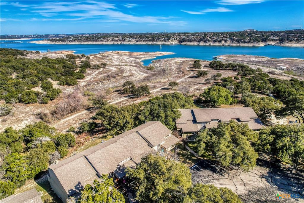 133 Comanche Drive Point Venture, TX 78645 - Photo 28 of 32 an aerial view of residential building and ocean