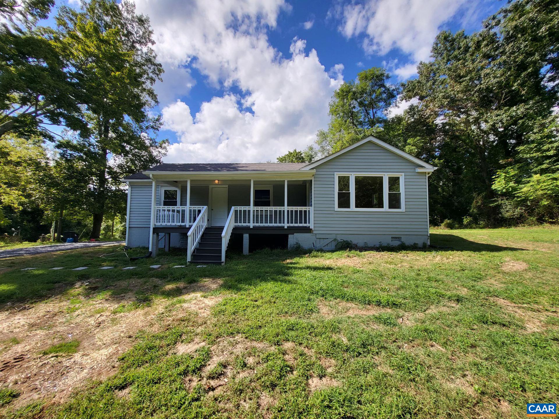 7548 Laurel Road Shipman, VA 22971 - Photo 1 of 10 a view of a house with a yard porch and sitting area