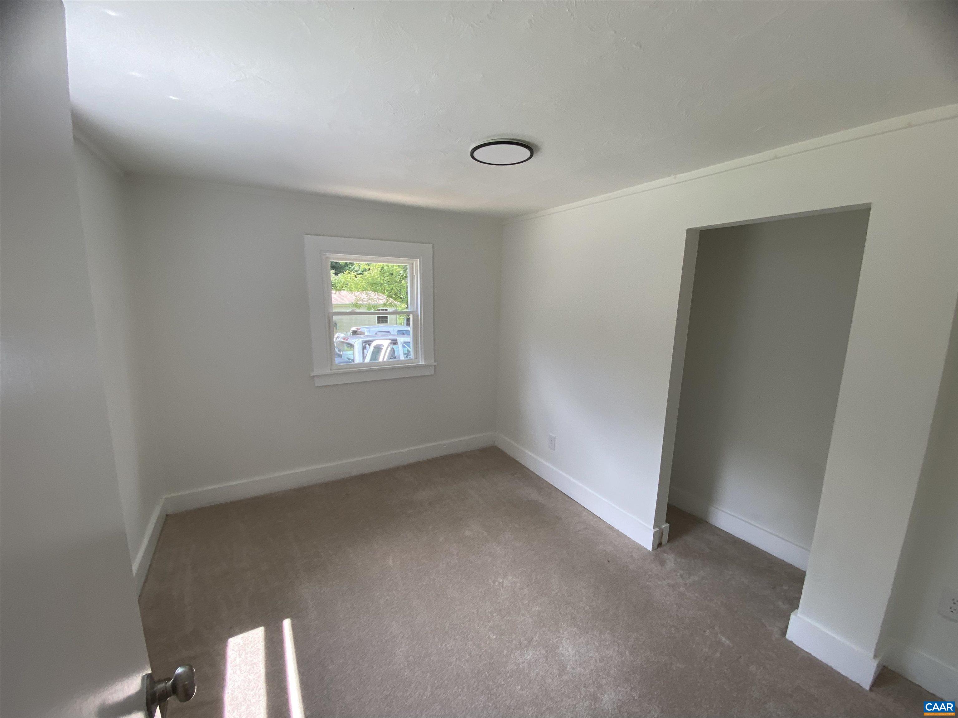 7548 Laurel Road Shipman, VA 22971 - Photo 8 of 10 an empty room with windows