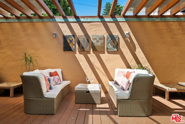 a living room with a couch and a table