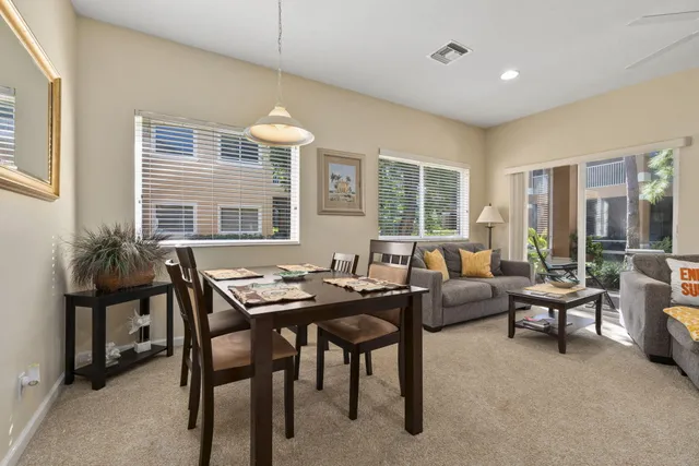a kitchen with stainless steel appliances a stove a sink and refrigerator