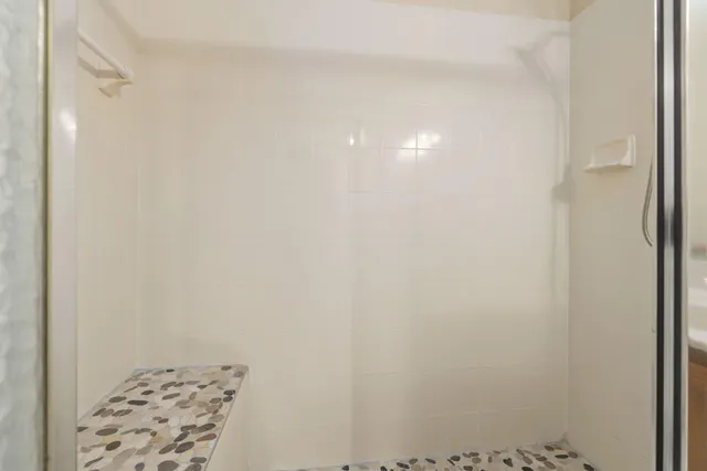 a living room with furniture kitchen view and a dining table