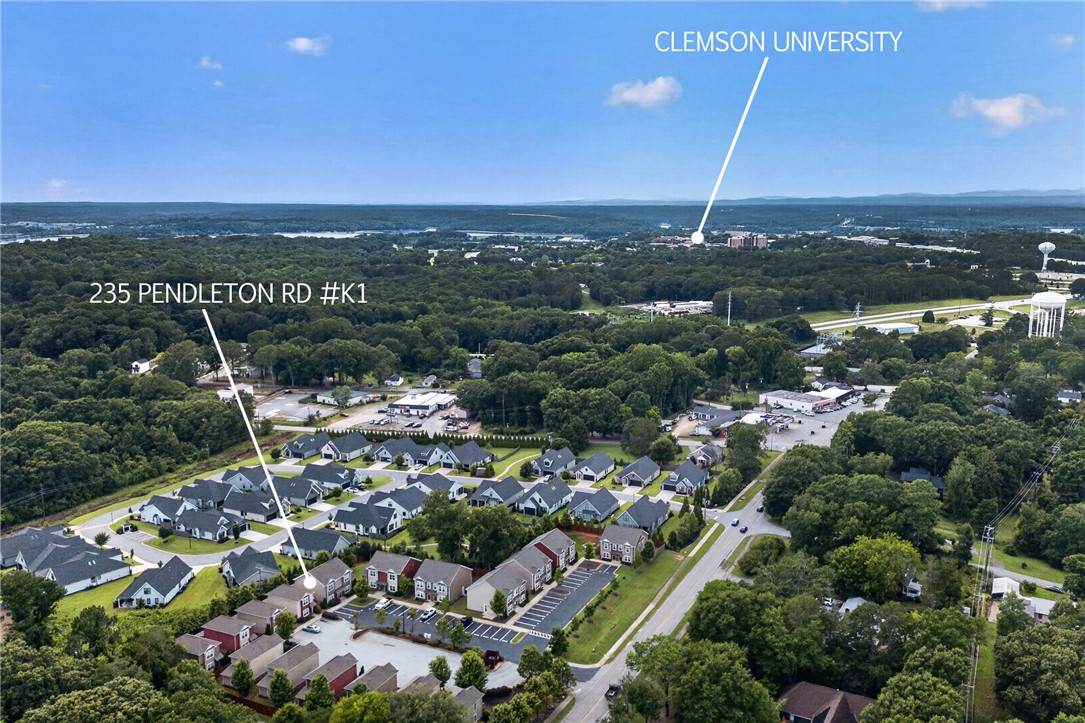 235 Pendleton Road, Unit K1 Clemson, SC 29631 - Photo 48 of 49 An aerial perspective reveals a vibrant neighborhood with dense green landscaping, offering both residential charm and proximity to a university campus.