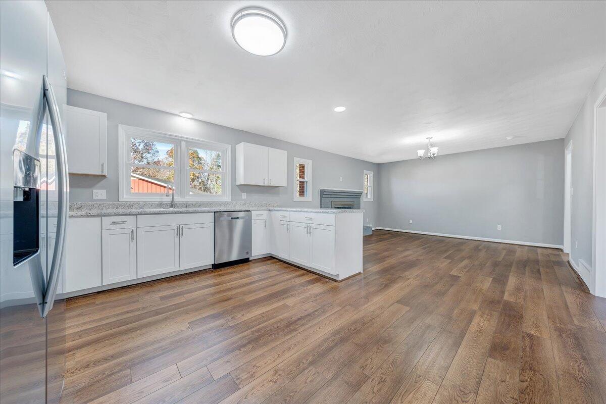 2353 Thompson Ridge Road Ferrum, VA 24088 - Photo 15 of 46 a view of a kitchen with wooden floor
