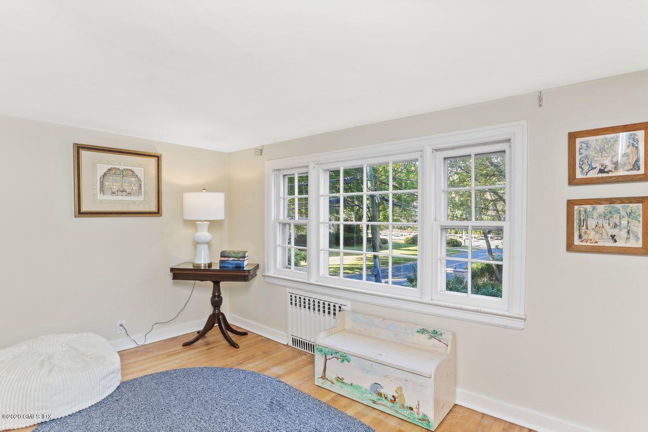 11 Indian Head Road Riverside, CT 06878 - Photo 22 of 30 a living room with furniture and a window