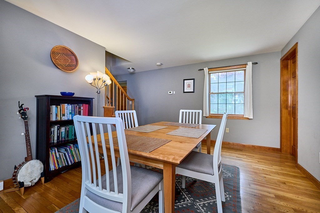 410 Hadley Road Sunderland, MA 01375 - Photo 8 of 32 a view of a dining room with furniture and wooden floor