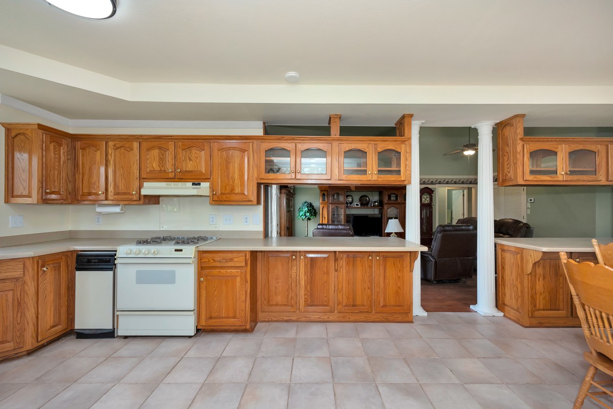 27615 Shannon Road Ardmore, AL 35739 - Photo 16 of 49 a kitchen with stainless steel appliances granite countertop a stove and a sink