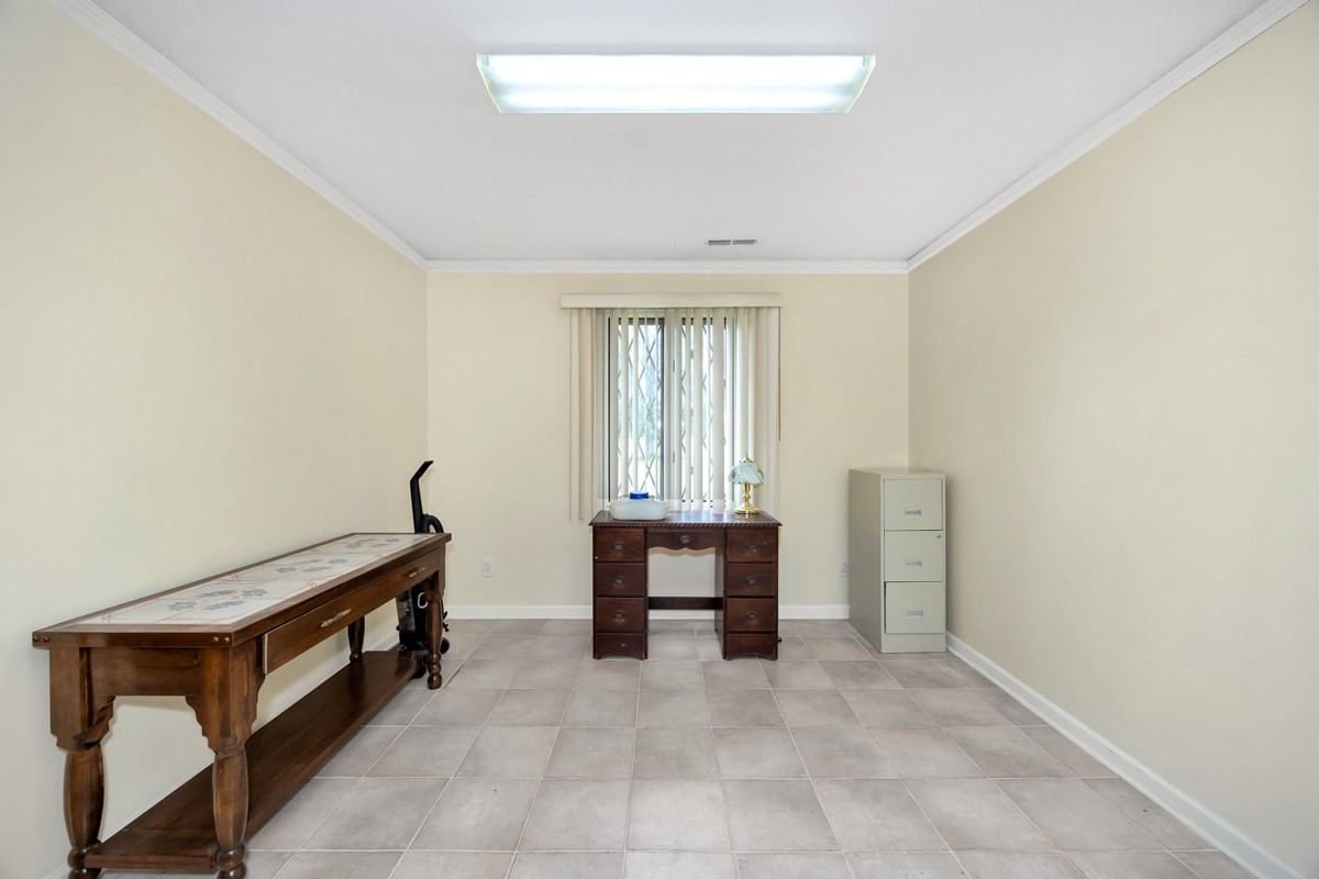 27615 Shannon Road Ardmore, AL 35739 - Photo 22 of 49 a spacious bedroom with a bed and a window