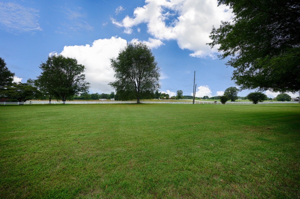 27615 Shannon Road Ardmore, AL 35739 - Photo 37 of 49 a view of a field with trees in the background