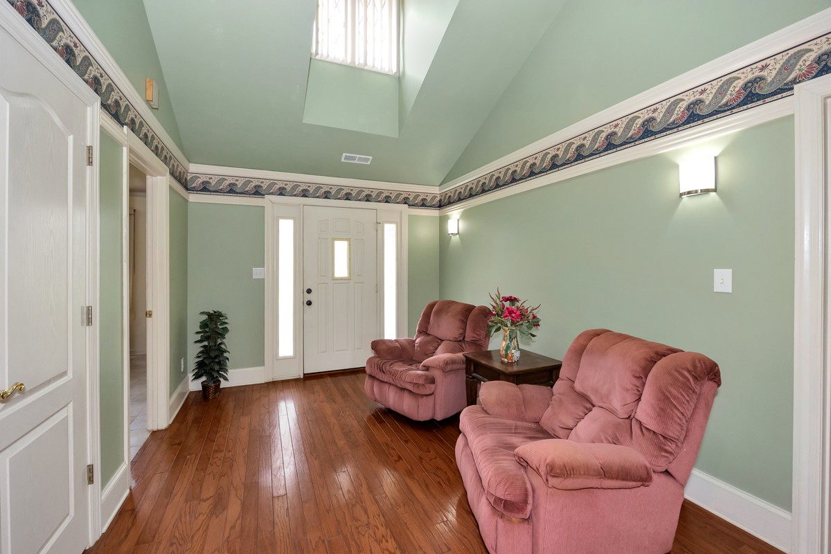27615 Shannon Road Ardmore, AL 35739 - Photo 4 of 49 a living room with furniture and wooden floor