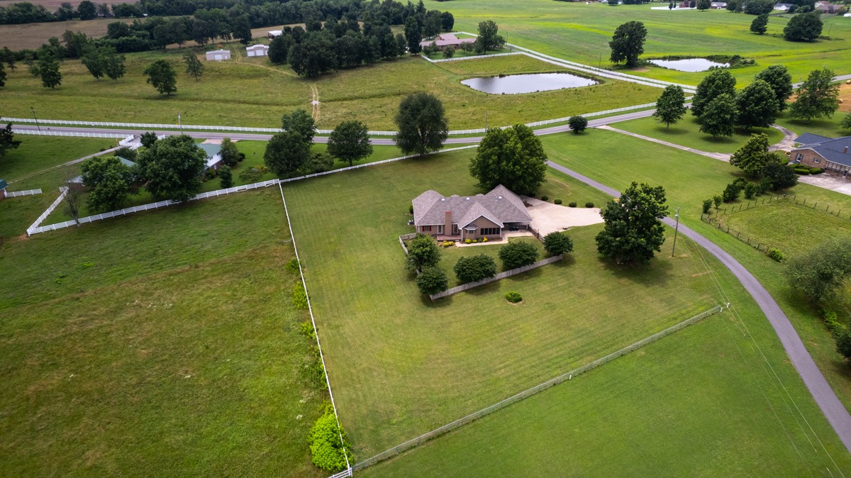 27615 Shannon Road Ardmore, AL 35739 - Photo 49 of 49 a view of a lake with a deck