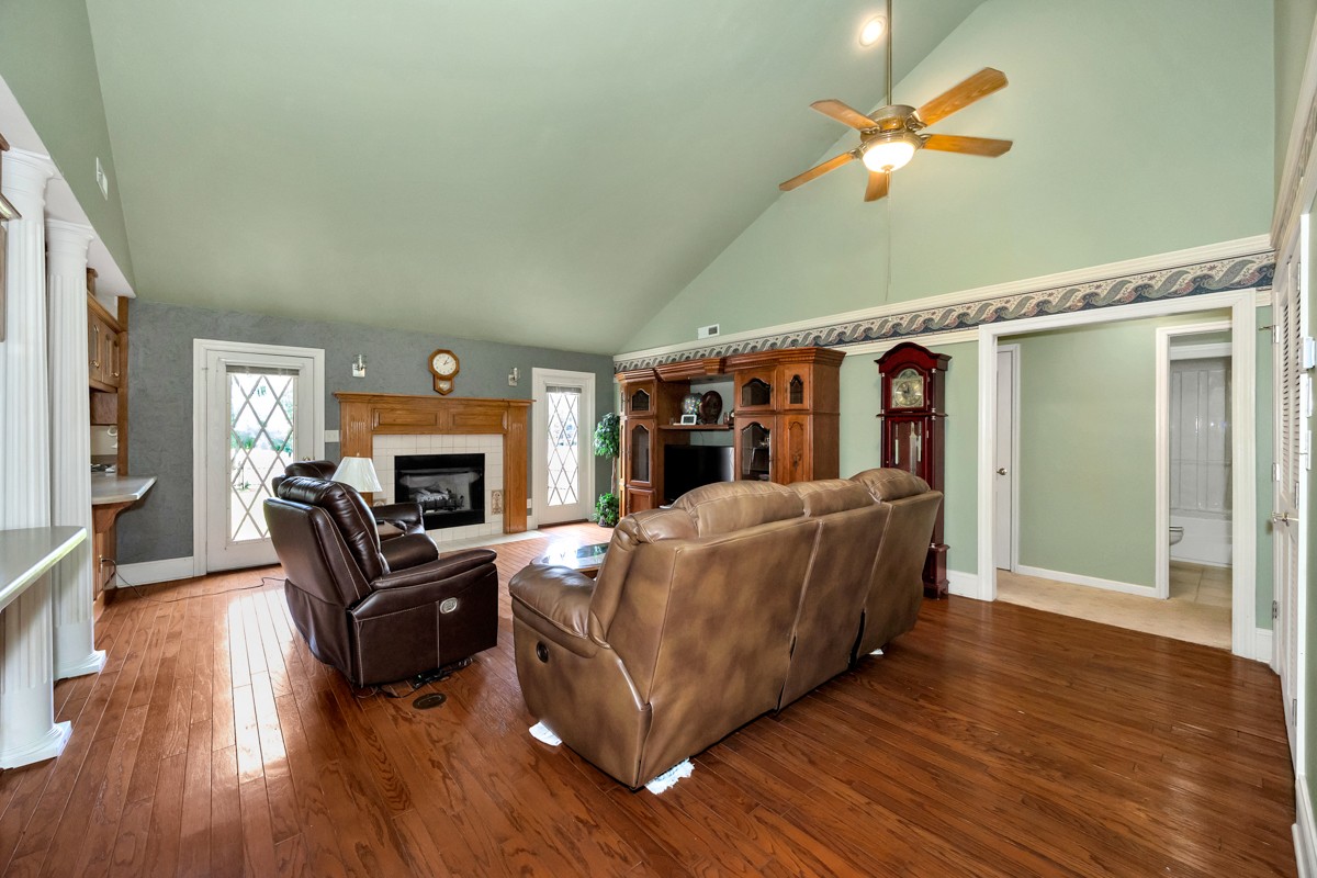 27615 Shannon Road Ardmore, AL 35739 - Photo 5 of 49 a living room with furniture and a fireplace