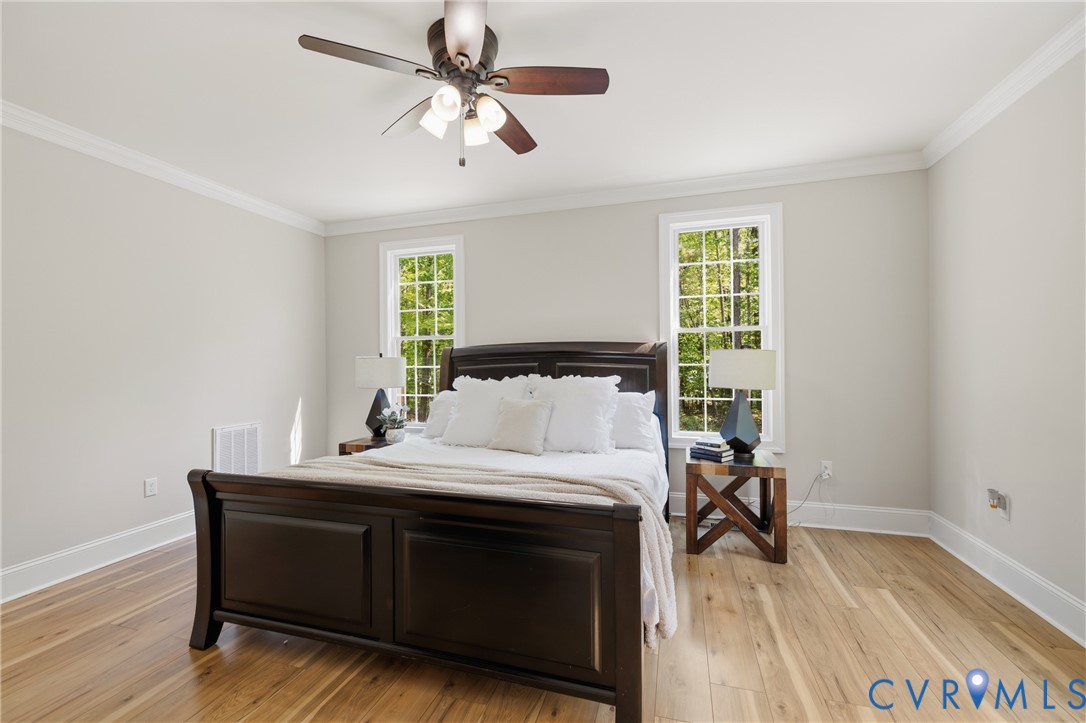 8825 First Branch Lane Chesterfield, VA 23838 - Photo 15 of 49 a bedroom with a bed and a table