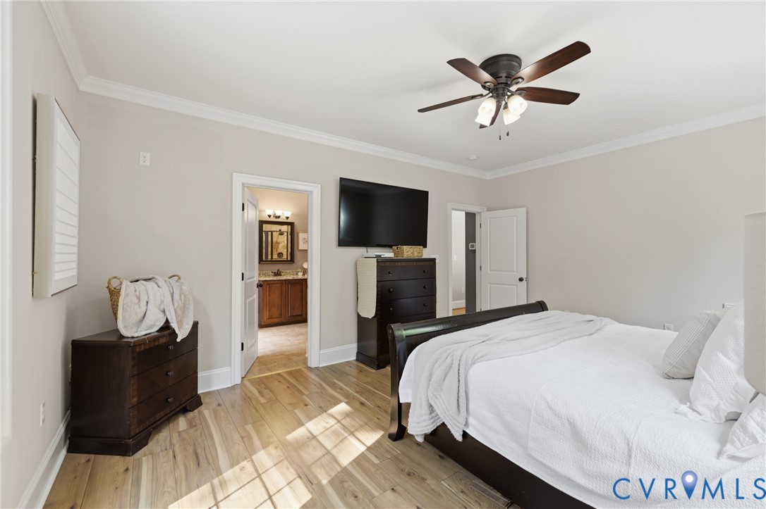 8825 First Branch Lane Chesterfield, VA 23838 - Photo 16 of 49 a bedroom with a bed and a flat screen tv