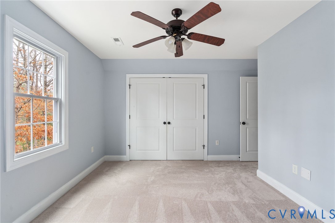 8825 First Branch Lane Chesterfield, VA 23838 - Photo 25 of 49 a view of an empty room with a window