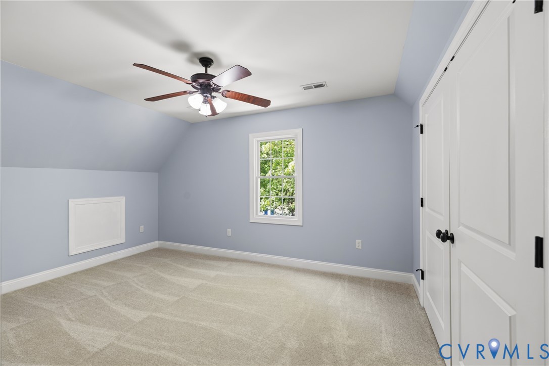 8825 First Branch Lane Chesterfield, VA 23838 - Photo 26 of 49 a view of room with a ceiling fan and a window