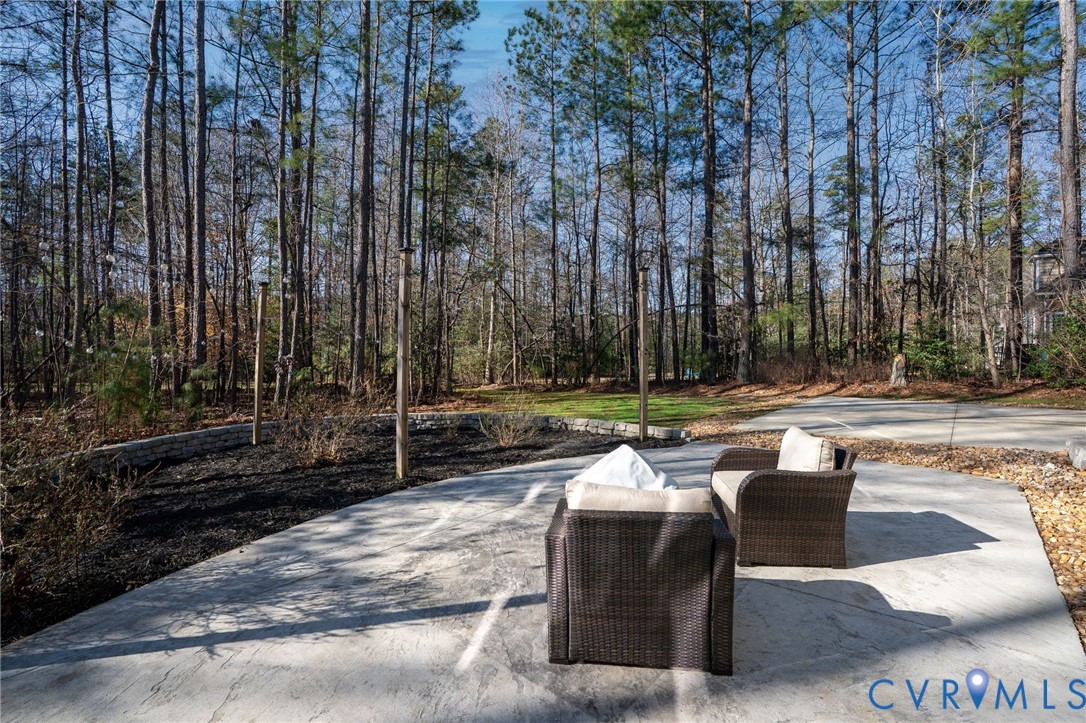 8825 First Branch Lane Chesterfield, VA 23838 - Photo 36 of 49 a view of swimming pool with outdoor seating and green space