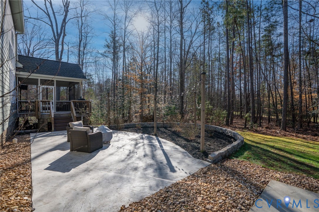 8825 First Branch Lane Chesterfield, VA 23838 - Photo 37 of 49 a view of a backyard with sitting area and garden