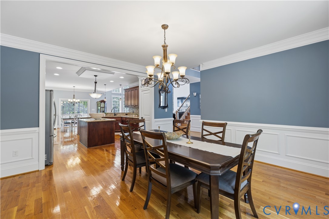 8825 First Branch Lane Chesterfield, VA 23838 - Photo 4 of 49 a view of a dining room with furniture and chandelier