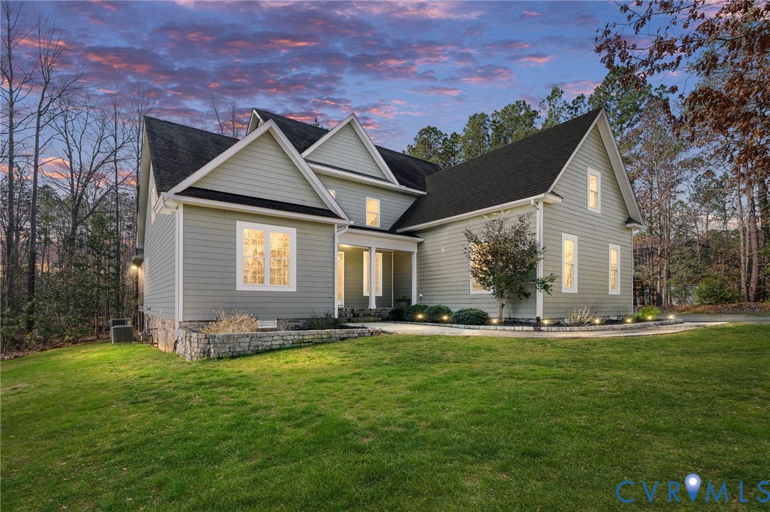 8825 First Branch Lane Chesterfield, VA 23838 - Photo 49 of 49 a front view of a house with a yard