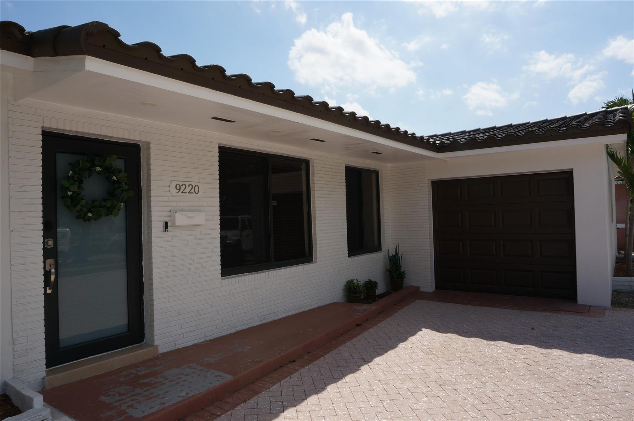 9220 Southwest 56th Street Miami, FL 33165 - Photo 4 of 23 a front view of a house