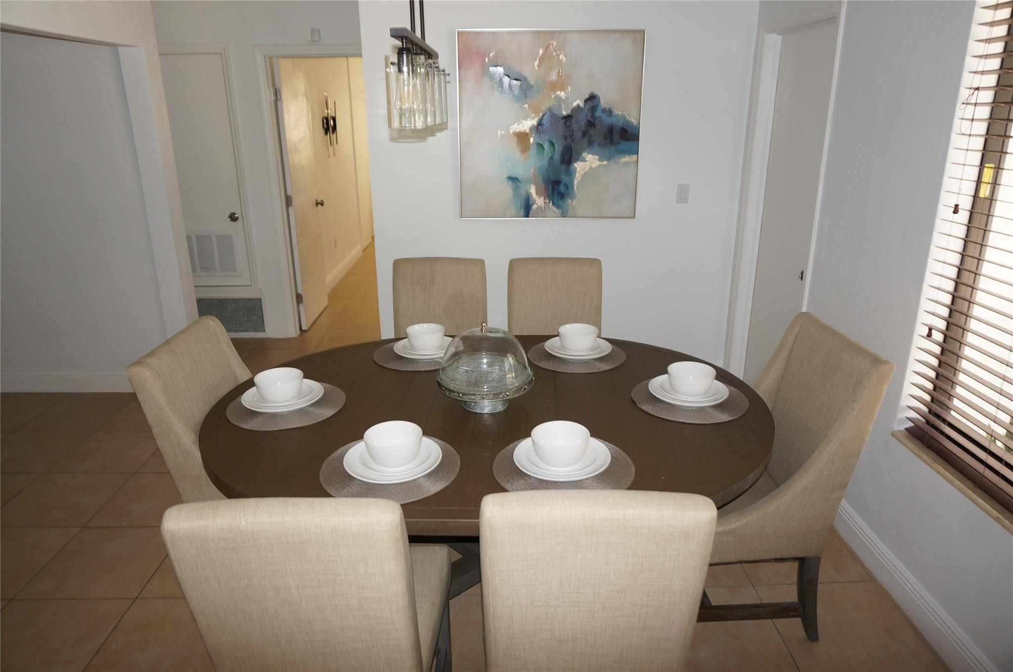 9220 Southwest 56th Street Miami, FL 33165 - Photo 8 of 23 a dining room with furniture and wooden floor