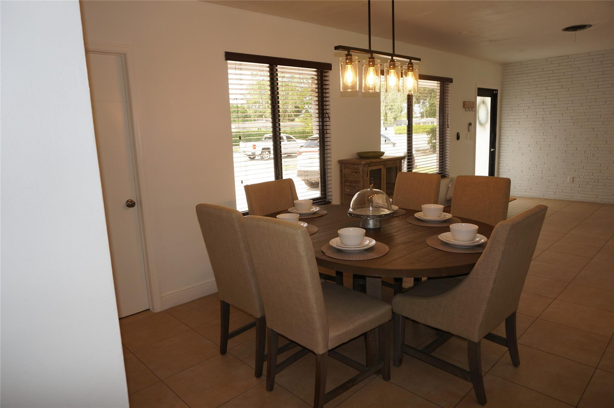 9220 Southwest 56th Street Miami, FL 33165 - Photo 9 of 23 a view of a dining room with furniture window and outside view
