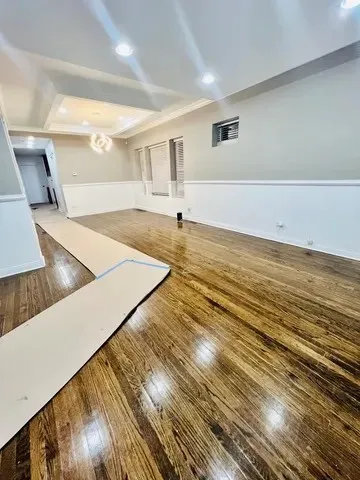 a view of a living room with a rug