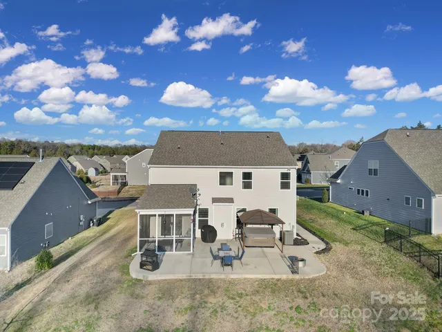 view of a house with a yard
