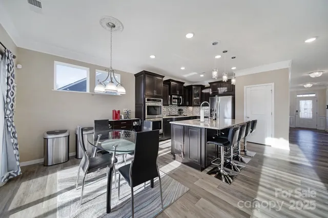 a view of a dining room with furniture