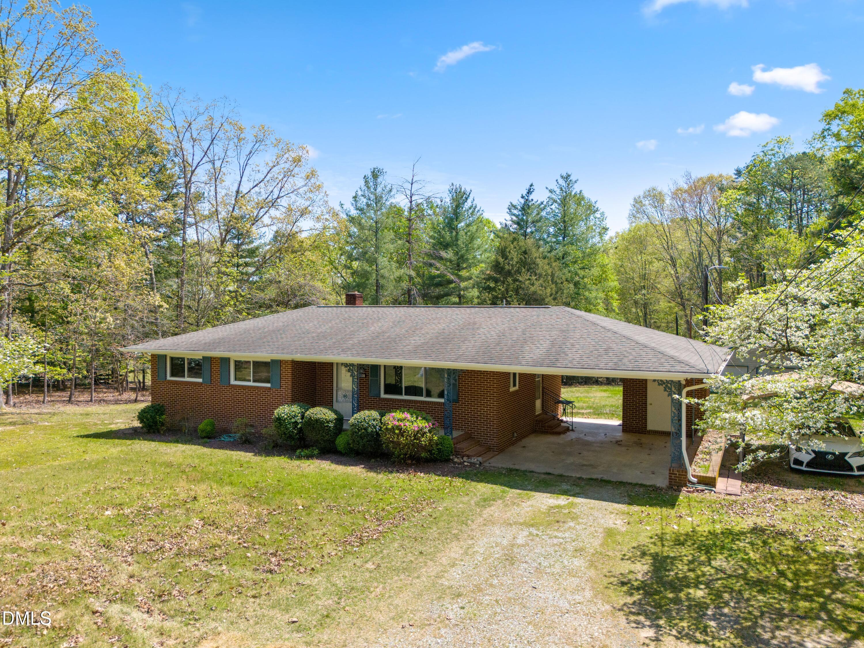 a house with trees in the background