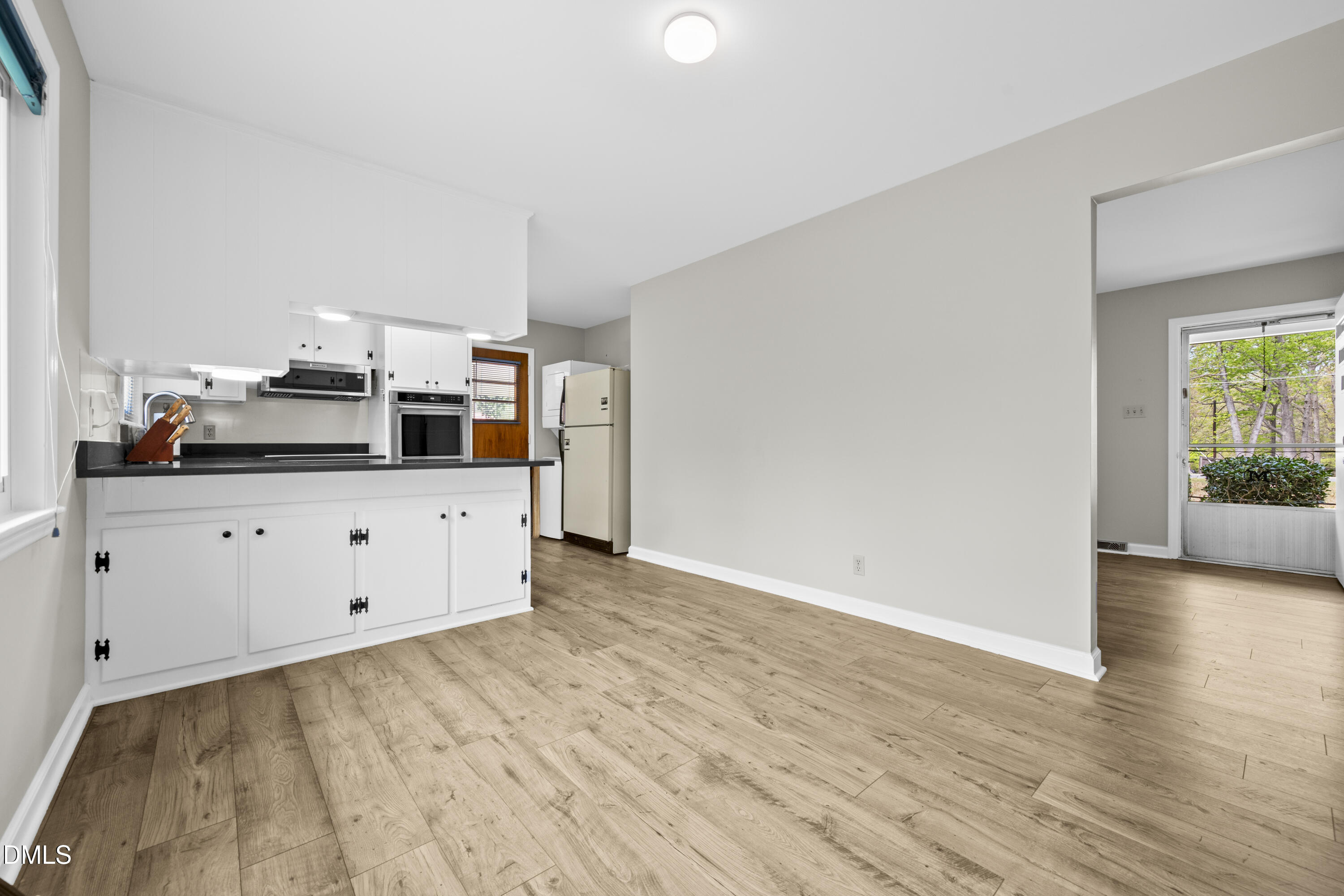 518 Goodwin Road Durham, NC 27712 - Photo 13 of 38 a view of a kitchen with wooden floor