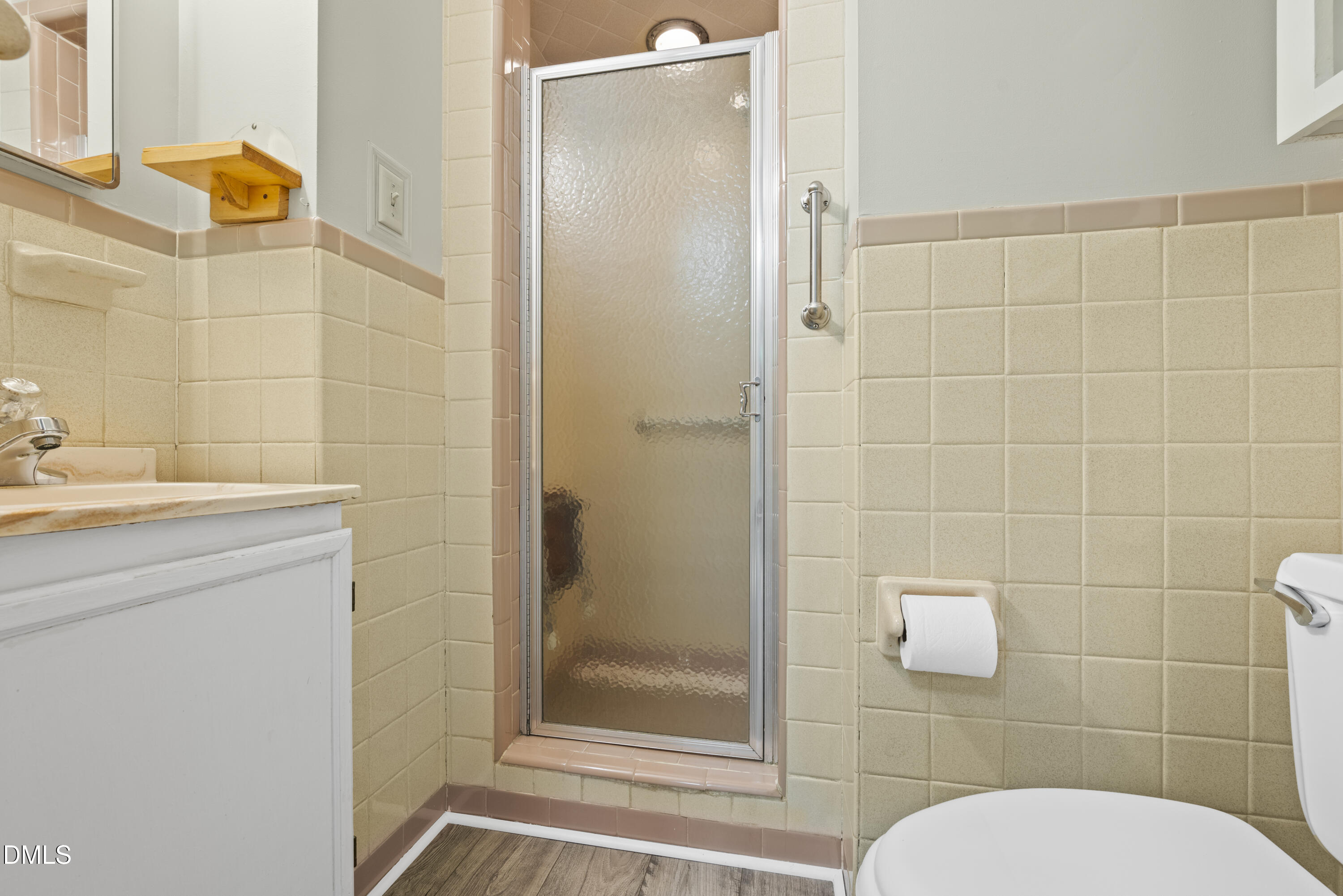 518 Goodwin Road Durham, NC 27712 - Photo 16 of 38 a bathroom with a toilet and shower