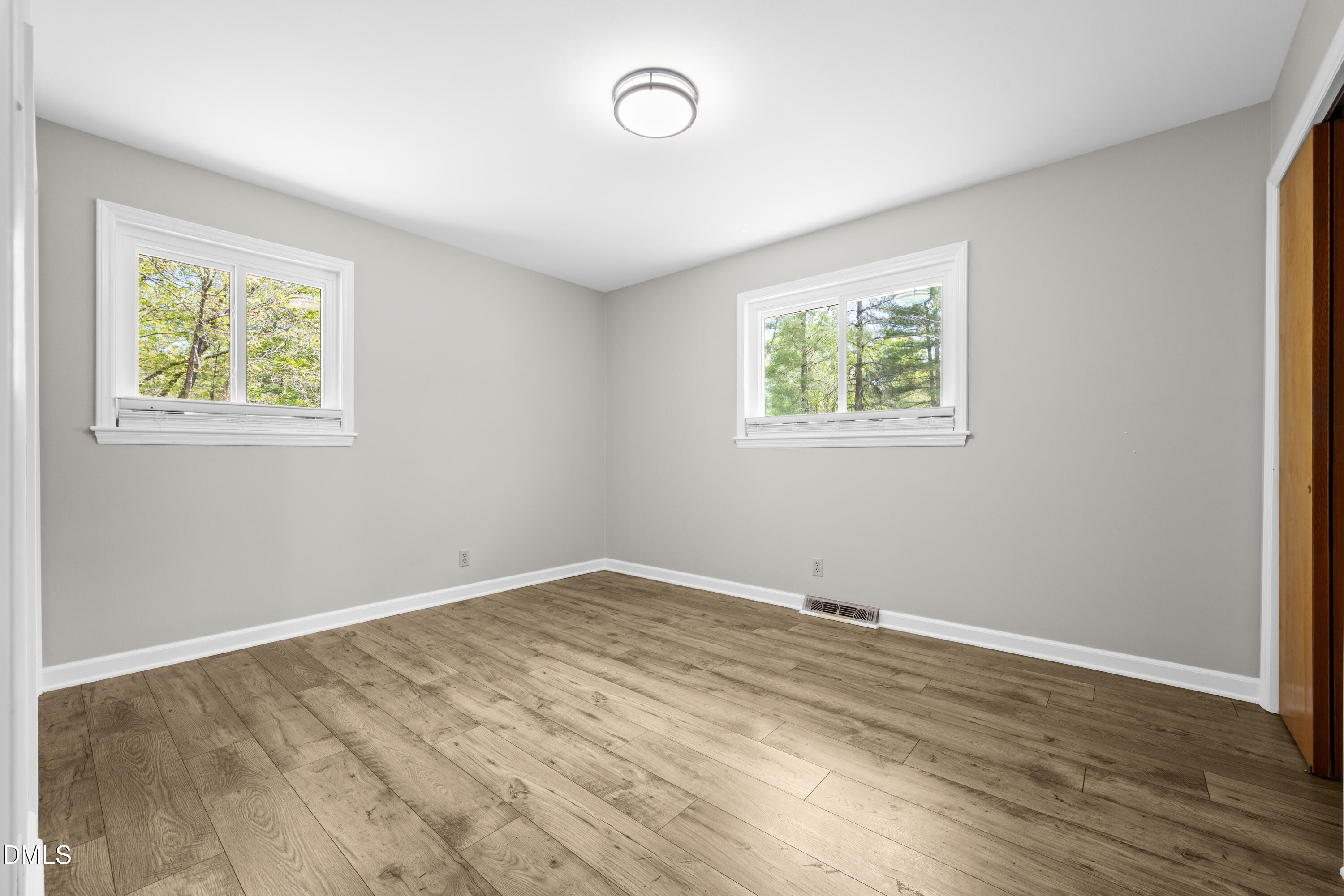 518 Goodwin Road Durham, NC 27712 - Photo 19 of 38 a view of room with window and ceiling fan
