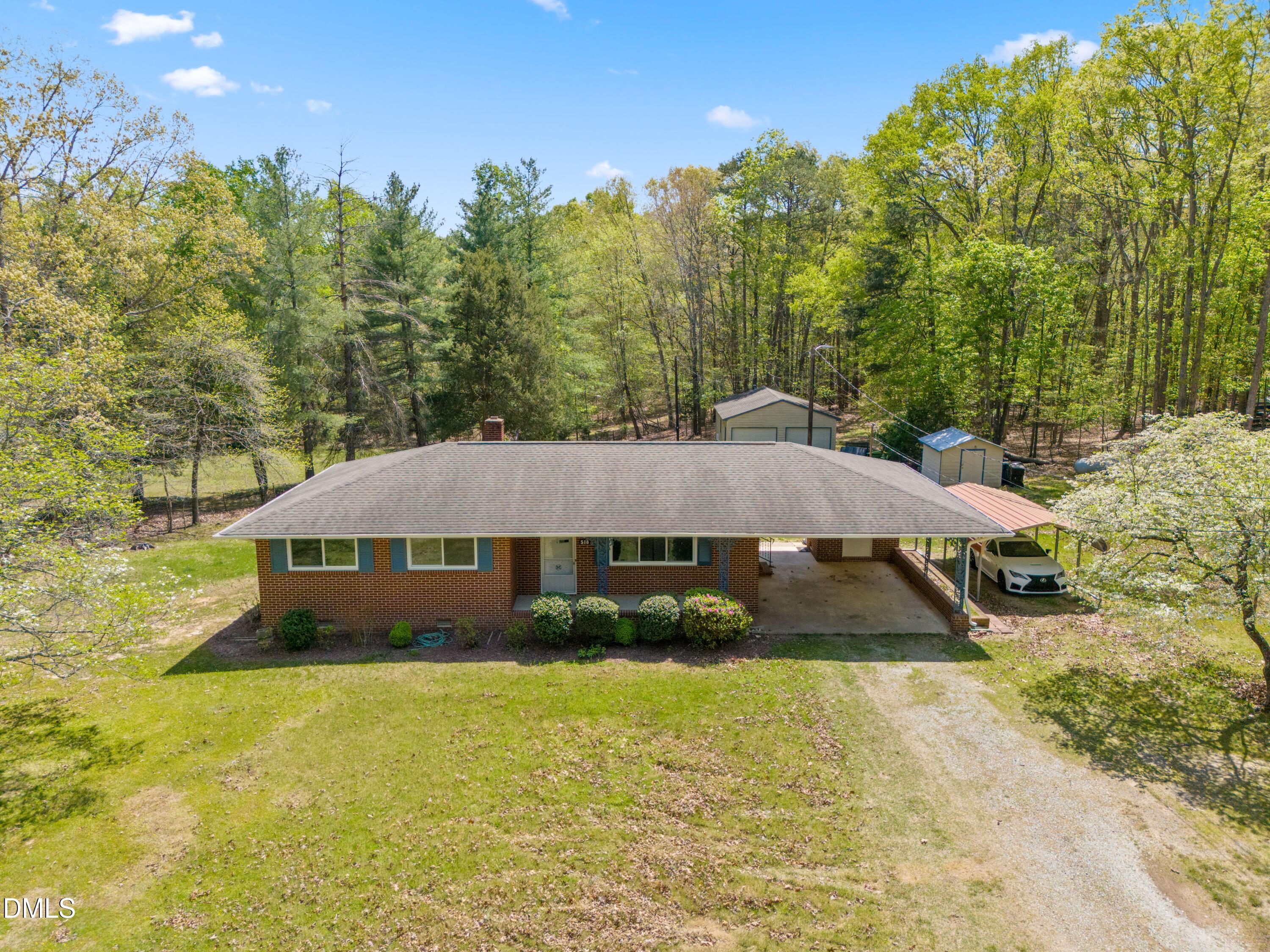 518 Goodwin Road Durham, NC 27712 - Photo 2 of 38 a view of a house with swimming pool and sitting area