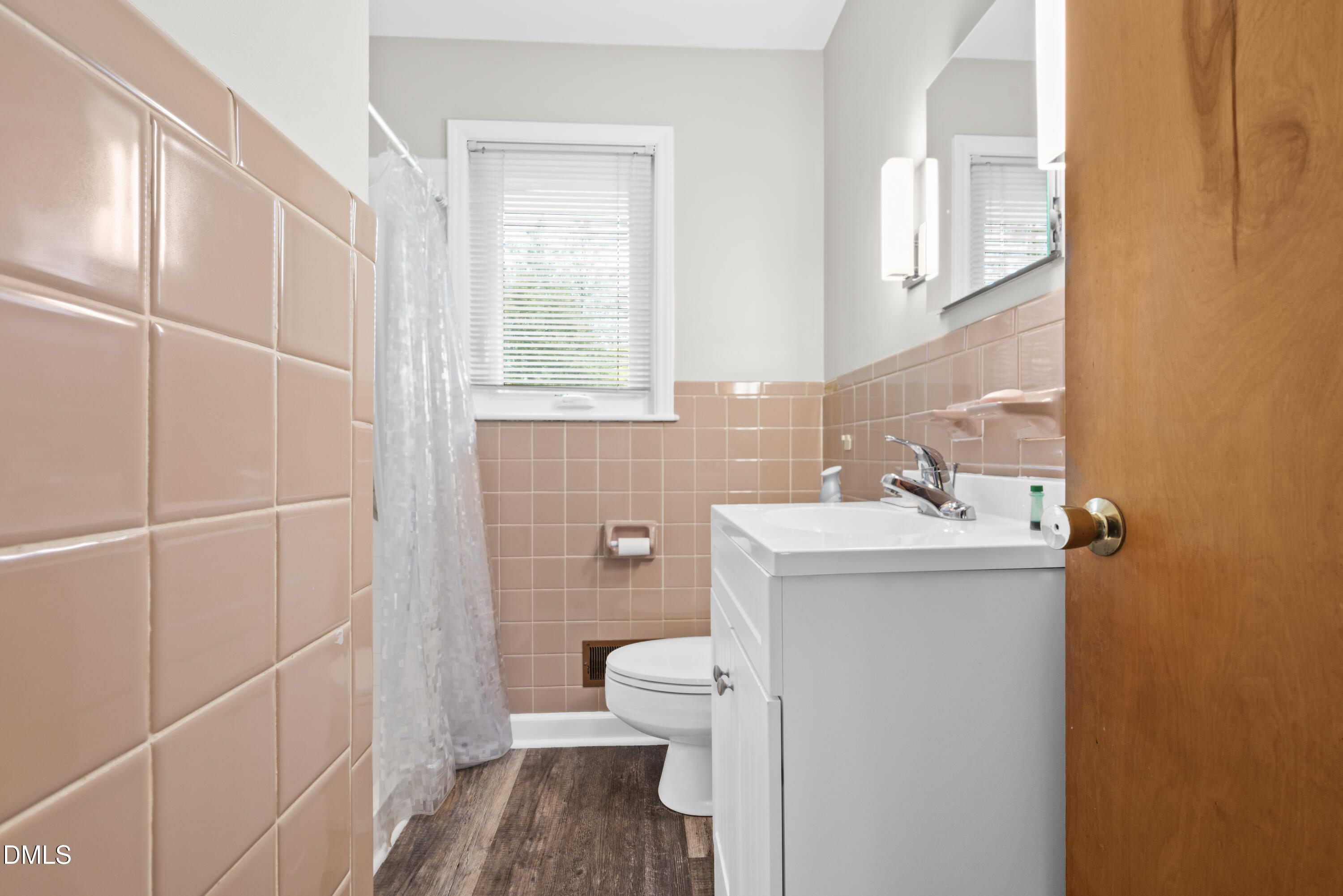 518 Goodwin Road Durham, NC 27712 - Photo 22 of 38 a bathroom with a sink toilet and shower