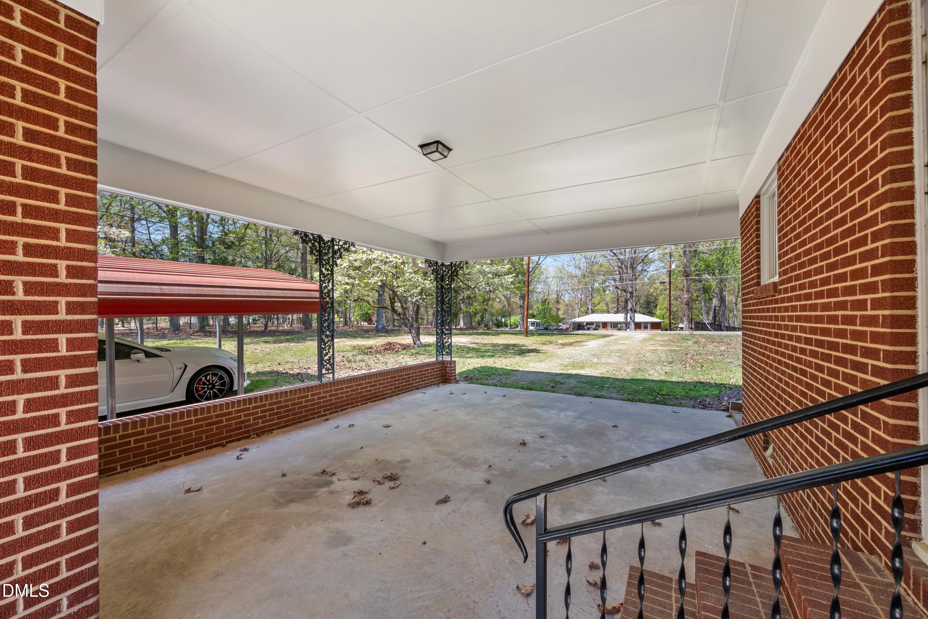 518 Goodwin Road Durham, NC 27712 - Photo 24 of 38 a view of a porch with wooden floor