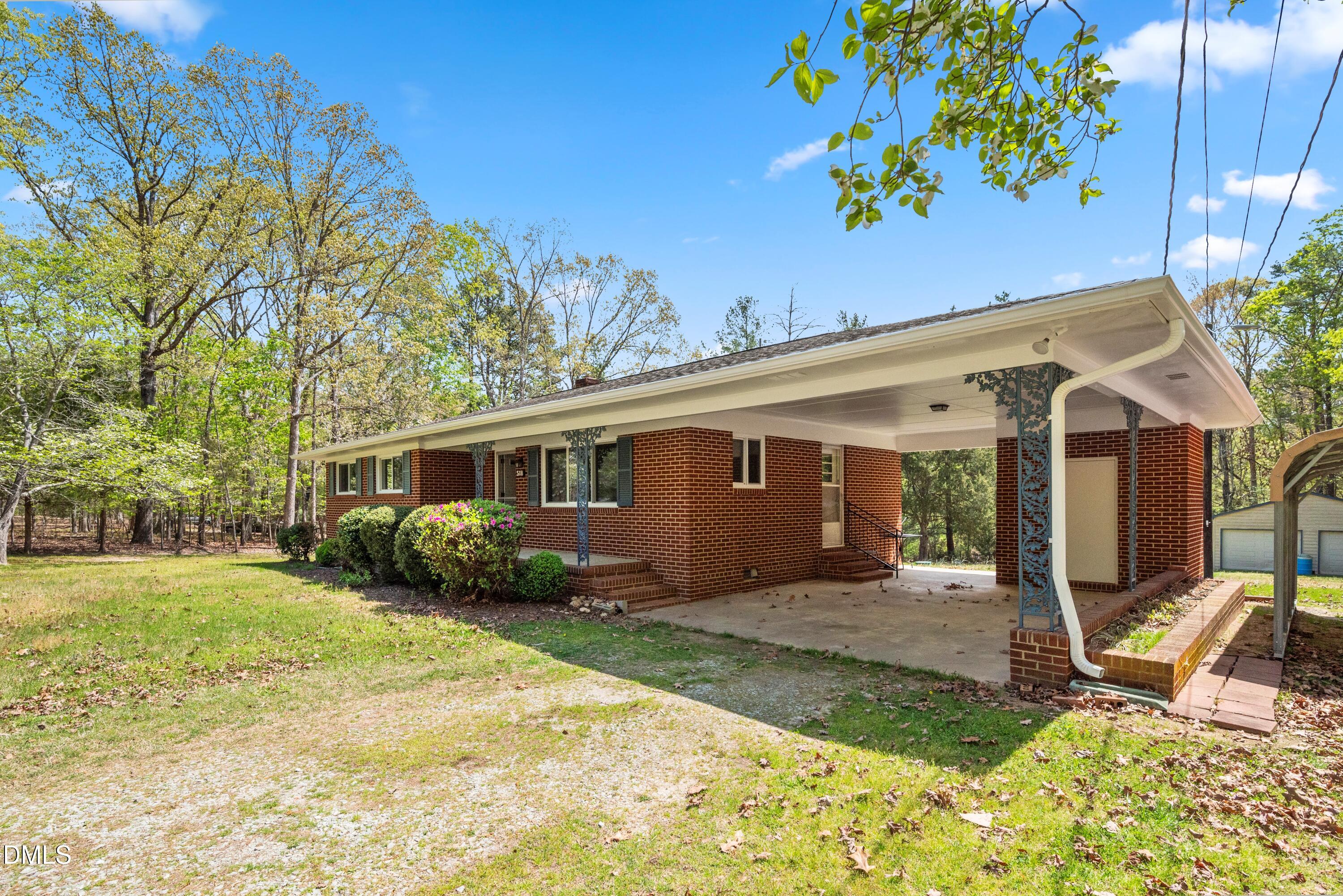 518 Goodwin Road Durham, NC 27712 - Photo 25 of 38 a view of a house with backyard and sitting area