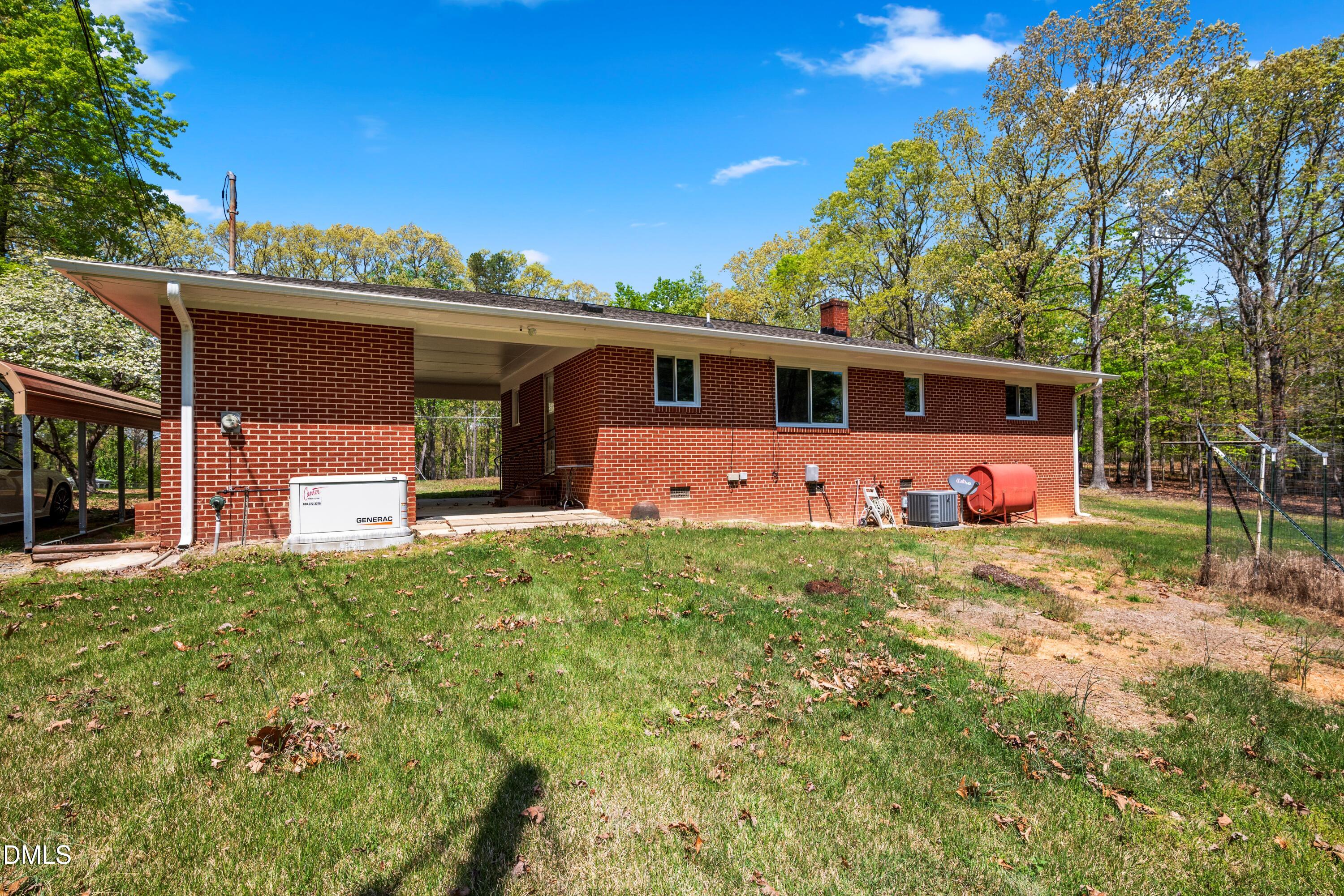 518 Goodwin Road Durham, NC 27712 - Photo 29 of 38 a front view of a house with garden