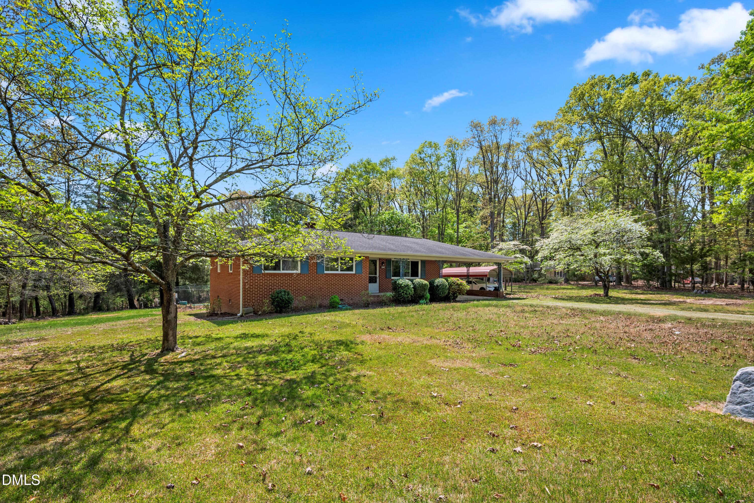518 Goodwin Road Durham, NC 27712 - Photo 30 of 38 a view of a house with a yard and tree s