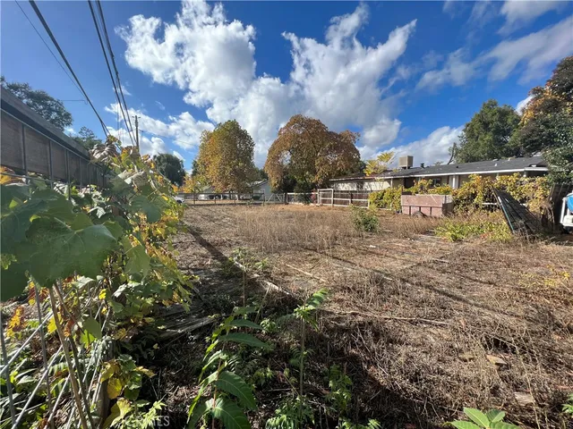 a view of swimming pool with sitting area